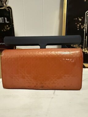 Coach Embossed Liquid Gloss Leather Clutch Wallet